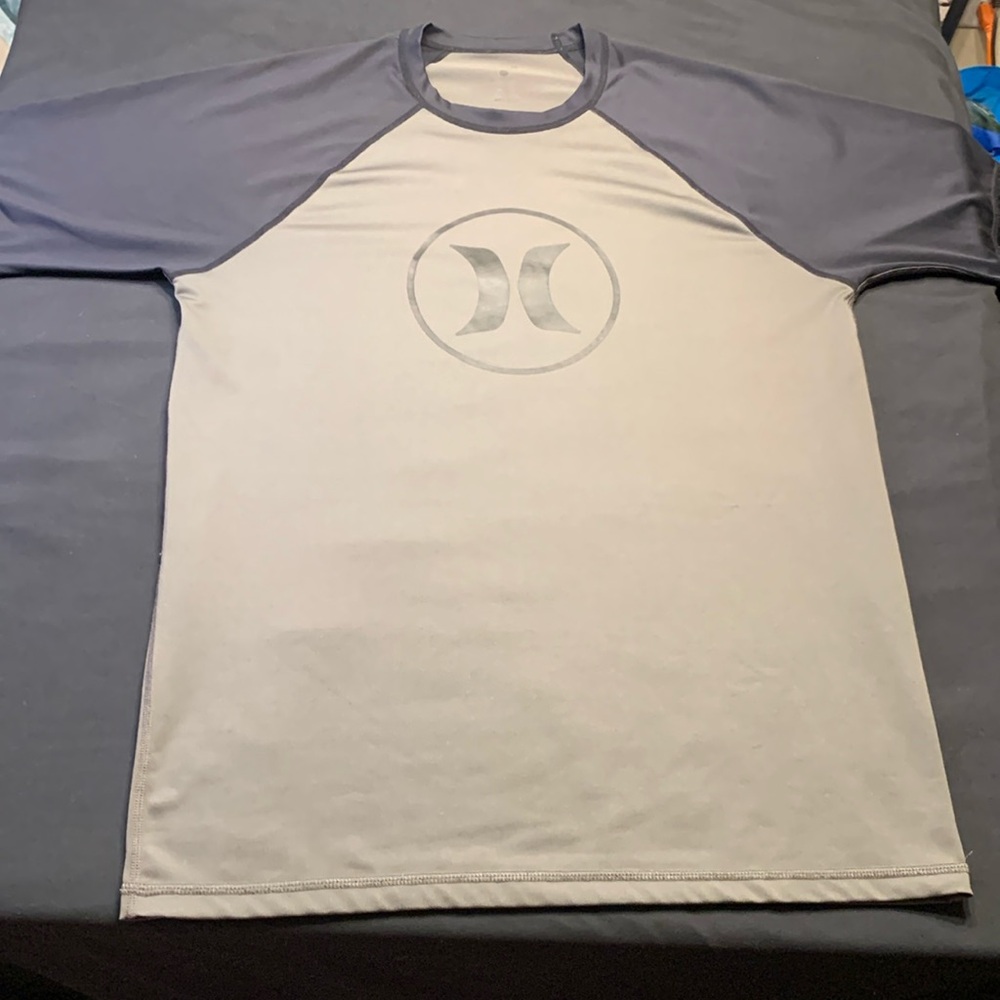 A Hurley size large beach rash guard shirt